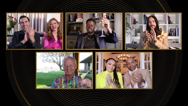 In this video grab issued Sunday, Feb. 28, 2021, by NBC, nominees in the category for best supporting actor in a motion picture react as Daniel Kaluuya, top center, is announced as the winner for his role in “Judas and the Black Messiah” at the Golden Globe Awards.
