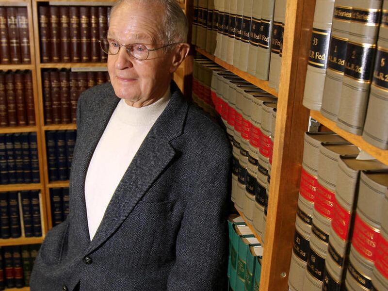 In this Dec. 29, 2010 photo, attorney Harry Turner stands in his law office in Twin Falls, Idaho. Turner, 83, is blind, but it hasn't stopped him from living a successful, adventurous life.