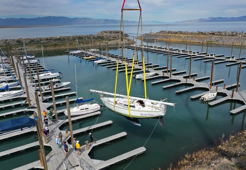 Sailboats are hoisted into the Great Salt Lake marina in Salt Lake City on Tuesday, June 6, 2023.