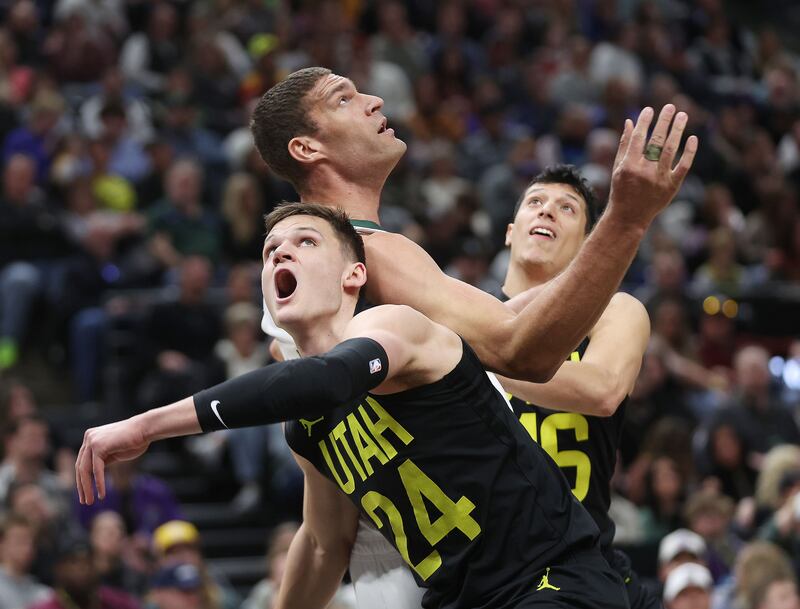 Utah Jazz’s Walker Kessler battles for position during game against the Milwaukee Bucks in Salt Lake City, March 24, 2023.