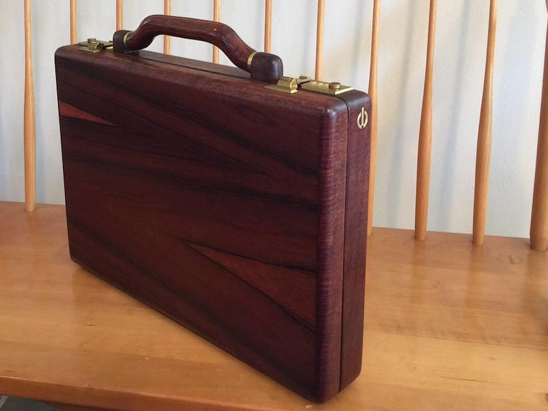 The distinctive gold symbol on the end of this brief case proves that it is indeed a Jeffrey Benjamin briefcase and is evidence that I have obtained the holy grail of wooden briefcases.