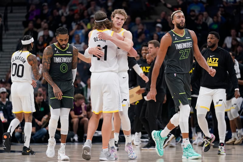 Utah Jazz forward Kelly Olynyk (41) and forward Lauri Markkanen (23) celebrate a Jazz basket during the second half of the team’s NBA basketball game against the Minnesota Timberwolves, Friday, Oct. 21, 2022, in Minneapolis. (AP Photo/Abbie Parr)