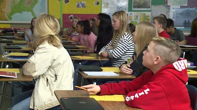 Students in one of Krista Gibbons' classes learn about Utah's history of farming in West Jordan, Tuesday, Dec. 11, 2018.