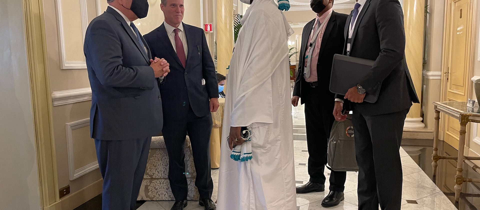 Elder Ronald A. Rasband, left, greets Nasr-Eddin Mofarah, Sudan’s minister of religious affairs in Bologna, Italy.