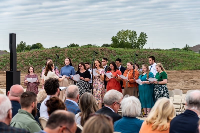 A choir of young single adults sings at the groundbreaking for the Wichita Kansas Temple.