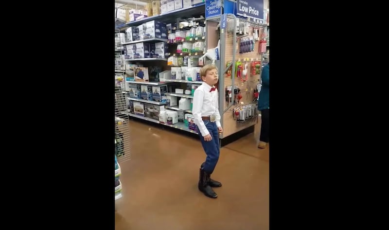 Ten-year-old Mason Ramsey yodels at Walmart in Harrisburg, Illinois.