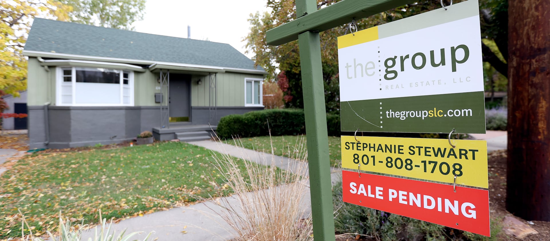 A “for sale” sign and “sale pending” sign are pictured in Salt Lake City on Monday, Oct. 18, 2021.
