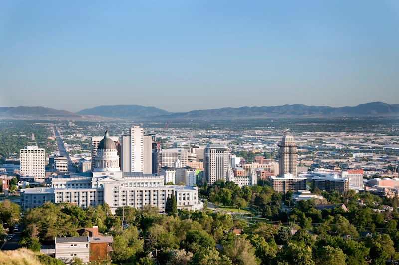 Skyline of Salt Lake City Utah with the Utah State Capitol Building and the historic Salt Lake Temple