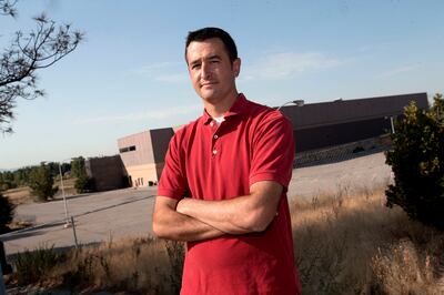 Paul Baker, a member of Unite for Holladay, stands outside the property of the former Cottonwood Mall site in Holladay on Thursday, Sept. 6, 2018.