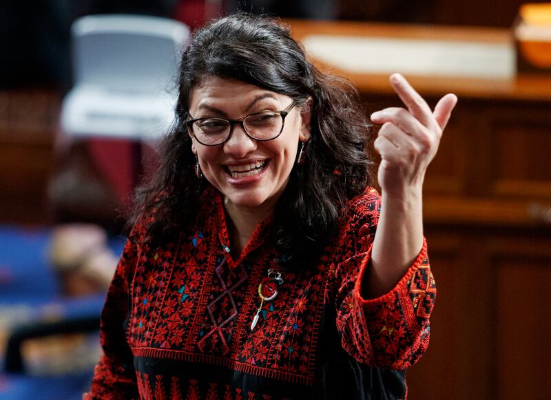 In this Thursday, Jan. 3, 2019 photo, then Rep.-elect Rashida Tlaib of Michigan, is shown on the house floor before being sworn into the 116th Congress at the U.S. Capitol in Washington.  Tlaib exclaimed at an event late Thursday that Democrats were going