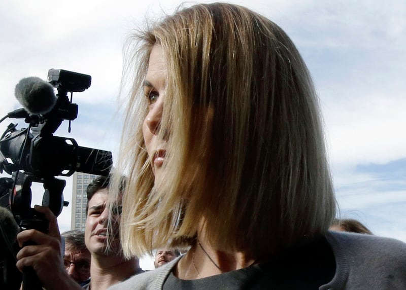 Lori Loughlin departs federal court Tuesday, Aug. 27, 2019, in Boston, after a hearing in a nationwide college admissions baribery scandal.