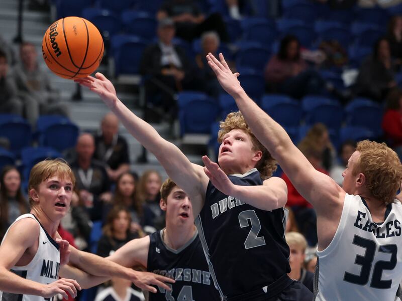 Duchesne’s Hunter Gardner drives to the basket against Millard in the 2A state championship tournament quarterfinals Feb. 23, 2023.