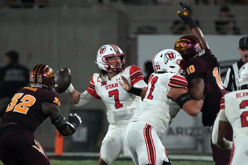 Utah quarterback Cameron Rising looks to throw against Arizona State, Friday, Oct. 11, 2024, in Tempe, Ariz.