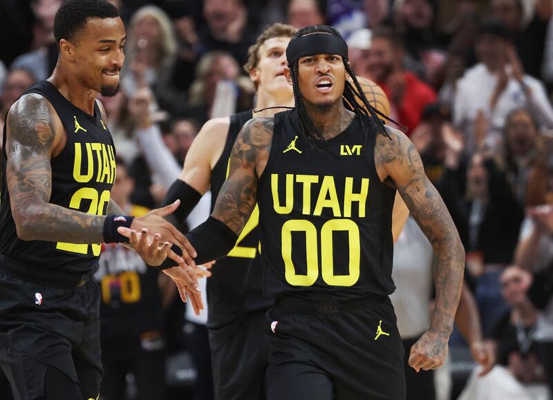 Utah Jazz guard Jordan Clarkson and Utah Jazz forward John Collins celebrate the Jazz win over the LA Clippers.