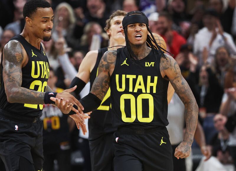 Utah Jazz guard Jordan Clarkson and Utah Jazz forward John Collins celebrate the Jazz win over the LA Clippers.