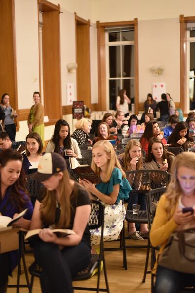 Teens read at a Marissa Meyer event at the Provo City Library.