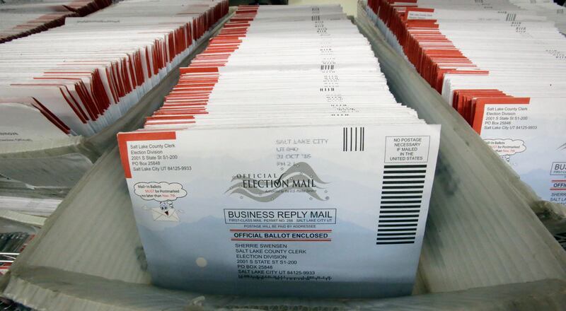 Mail-in ballots for the 2016 General Election are shown at the elections ballot center at the Salt Lake County Government Center Tuesday, Nov. 1, 2016, in Salt Lake City.