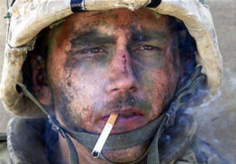 This photo of Marine Lance Cpl. James Blake Miller's smoke break after a 12-hour battle in Fallujah has been printed in hundreds of U.S. papers.