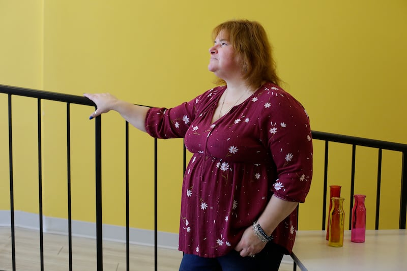 Carolyn Smigla, who has been volunteering at the National Runaway Safeline for 5 years takes a phone call, Friday, March 23, 2018 in Chicago, Illinois. Smigla helps youth, teens, parents and guardians seeking help with runaway victims or victims who are t