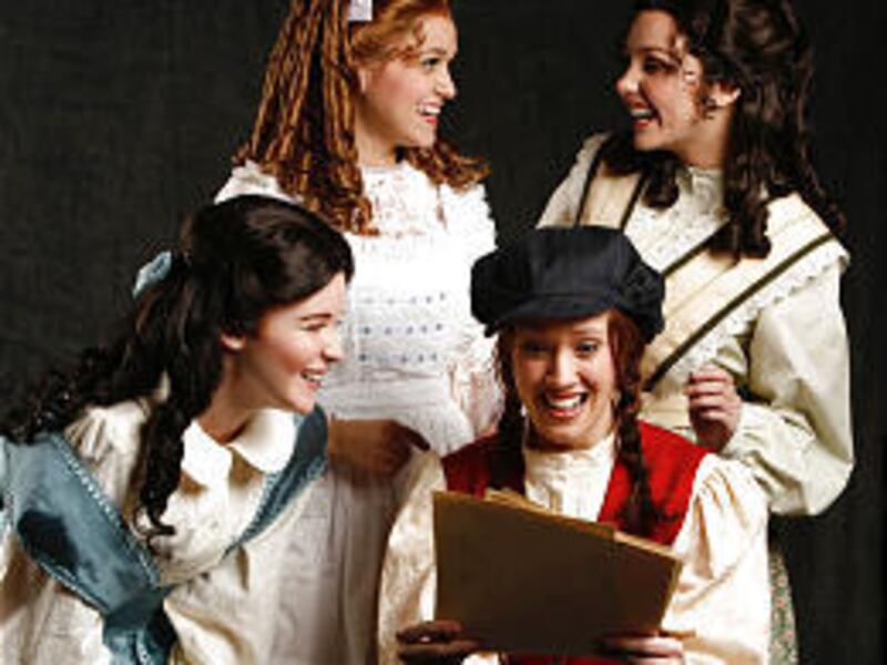 Jo (Nicole Walton, front right) is surrounded by her siblings (clockwise from front left) Beth (Kylee Janis), Amy (Rachel Woodward) and Meg (Katrina Nelson) in "Little Women."