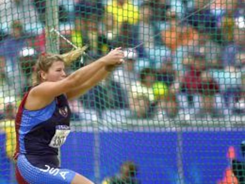 Amy Christensen Palmer, a former Grantsville High and BYU standout, earned a spot in the hammer finals -to be held Friday -as the 12th and final qualifier.