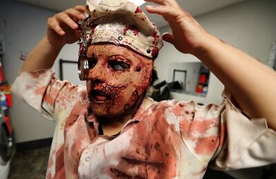 Genesis Paez, in her full scary doctor costume, at Fear Factory in Salt Lake City on Tuesday, Oct. 16, 2018.