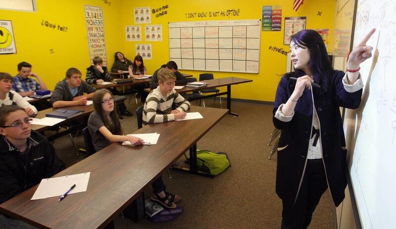 InTech Collegiate High School students listen to student teacher Olivia Kim during geometry/algebra class in North Logan Wednesday, April 24, 2013.