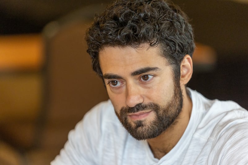 Giavani Cairo, who pays Thaddeus in “The Chosen,” talks to news media at the Salvation Army’s Camp Hoblitzelle in Midlothian, Texas, on Monday, Aug. 15, 2022.