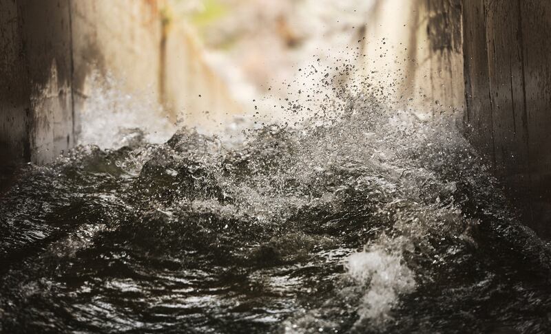 Water moves through a culvert as it begins to flow at Point of the Mountain in Draper on Tuesday. The Central Utah Water Conservancy District is redirecting the water to the Great Salt Lake to help in the flood control effort and expects to divert 50 million gallons per day.