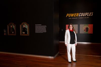 Leslie Anderson with her exhibition "Power Couples." The research and planning for the exhibition has been years in the making.