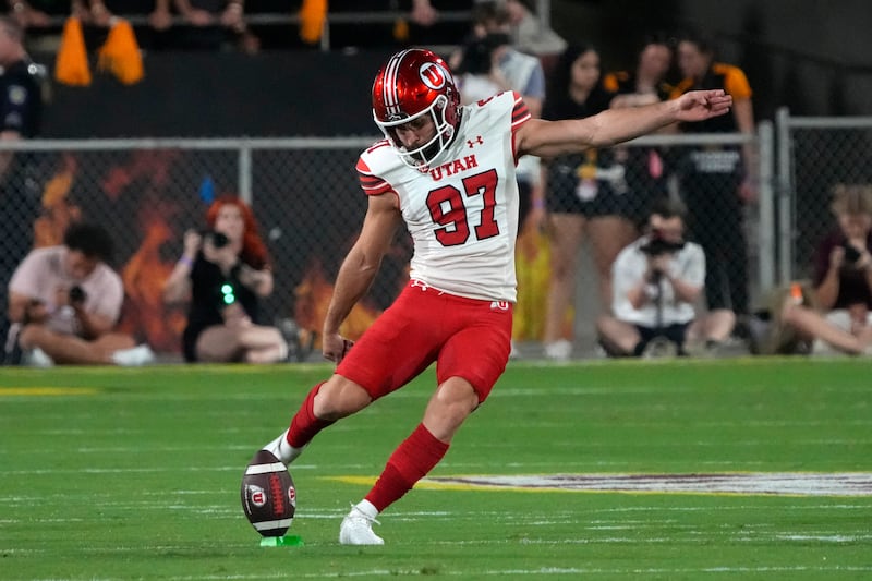 Utah kicker Jadon Redding kicks off during game against Arizona State, Saturday, Sept. 24, 2022, in Tempe, Ariz.