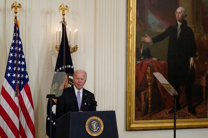 President Joe Biden speaks before signing an executive order in the East Room of the White House.