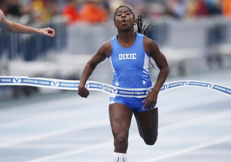 Dixie's Starlee Woodbury won the 100 meters at the state track and field meet on Saturday.