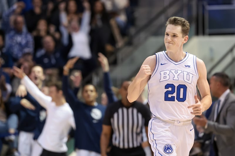 BYU guard Spencer Johnson reacts after hitting a 3-pointer during a game against the Gonzaga Bulldogs.