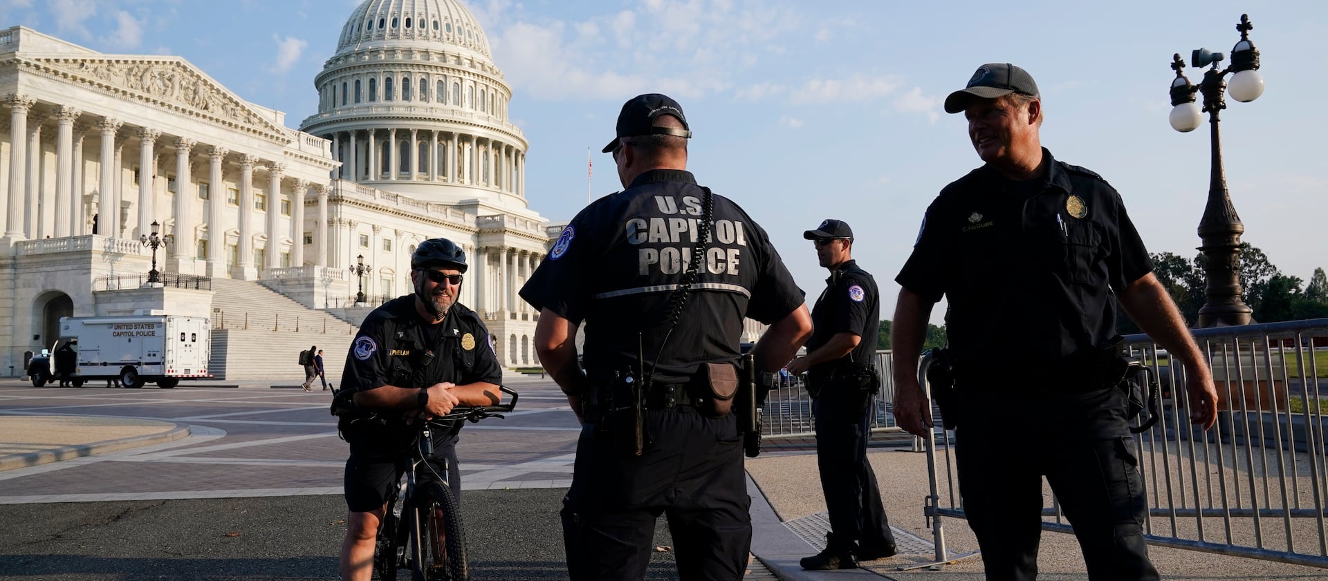 The U.S. Capitol is seen in Washington, early Tuesday, July 27, 2021, as U.S. Capitol Police keep eyes on the perimeter.