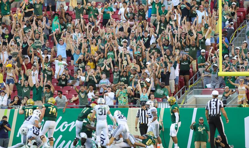 University of South Florida fans celebrate a rushing touchdown in the Bulls victory over BYU in Tampa, Florida, Oct. 12, 2019.