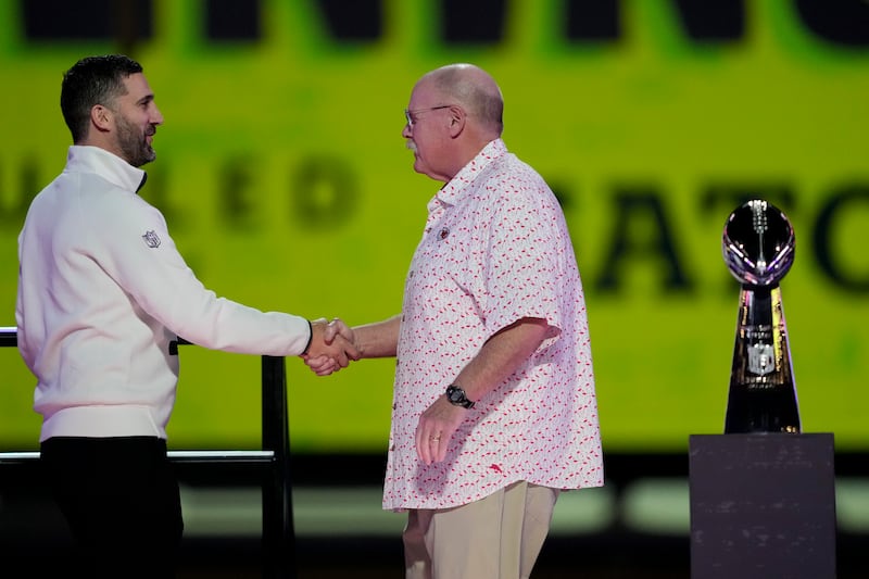Philadelphia Eagles head coach Nick Sirianni Kansas City Chiefs head coach Andy Reid shake hands during Super Bowl 59 Opening Night, Monday, Feb. 3, 2025, in New Orleans, ahead of the NFL football game between the Philadelphia Eagles and the Kansas City Chiefs Sunday.
