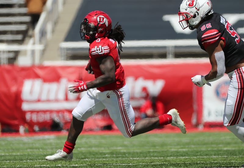 Utah Utes running back Chris Curry runs during the spring game in Salt Lake City on Saturday, April 17, 2021.