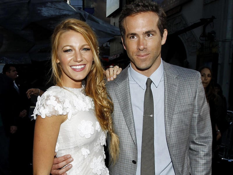 This June 15, 2011 file photo shows actors Blake Lively, left, and Ryan Reynolds at the premiere of “Green Lantern” in Los Angeles.