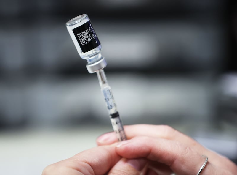 A COVID-19 vaccine is drawn at Salt Lake County Health Center in Salt Lake City on Oct. 4, 2023.