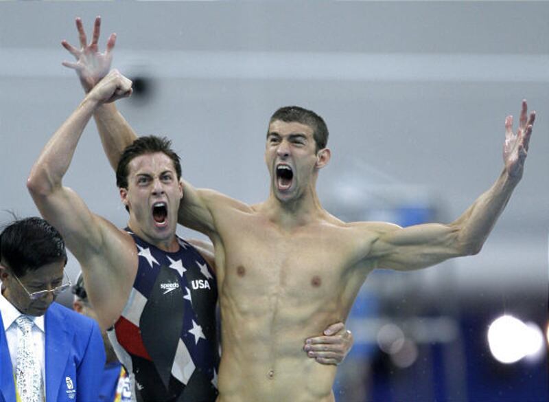 The United States' Michael Phelps, right, and teammate Garret Weber-Gale celebrate winning the gold in the men's 4x100-meter freestyle relay final in Beijing.