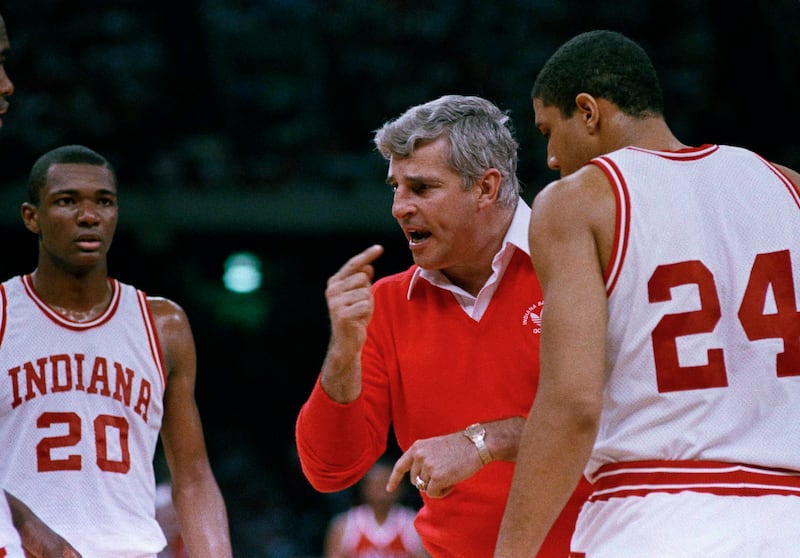 Indiana coach Bob Knight gestures while instructing players