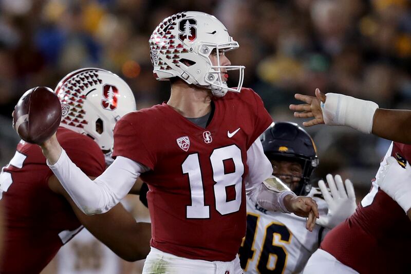 Stanford’s Tanner McKee throws a pass against California in Stanford, Calif., Saturday, Nov. 20, 2021.