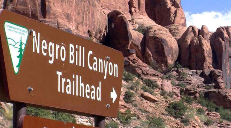 FILE - his undated photo shows a sign at the entrance of the Negro Bill Canyon Trailhead in Moab, Utah. The U.S. Board of Geographic Names voted Thursday to change the name of Negro Bill Canyon outside of Moab to Grandstaff Canyon in an acknowledgement of