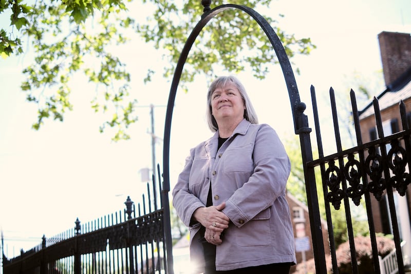 Melaney Tagg poses for a portrait outside of the Loudoun County Courthouse in Leesburg, Virginia.