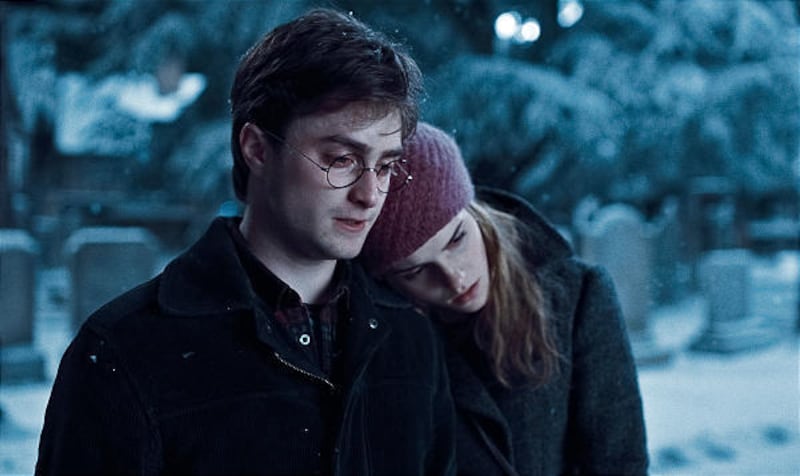 Daniel Radcliffe as Harry Potter and Emma Watson as Hermione Granger.