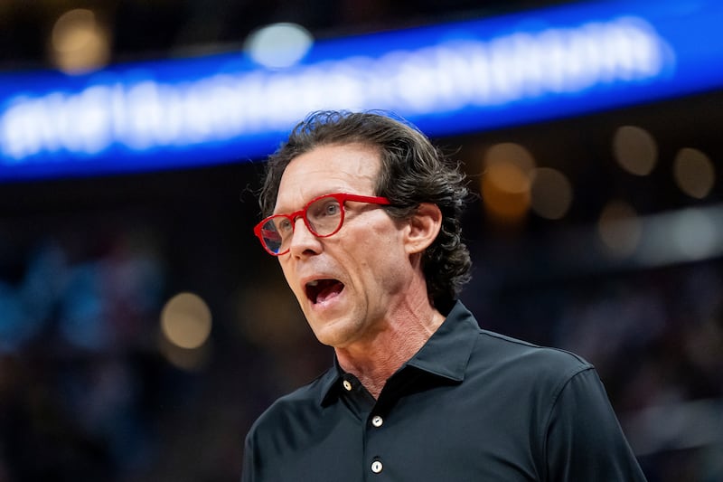 Atlanta Hawks coach Quin Snyder calls out to players during the second half of the team's NBA basketball game against the Utah Jazz, Friday, March 15, 2024, in Salt Lake City.