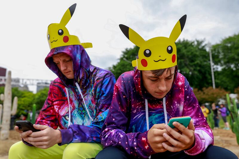 Colton Sullivan and his brother Sam participate in the Pokemon Go Fest 2019 on Thursday, June 13, 2019.