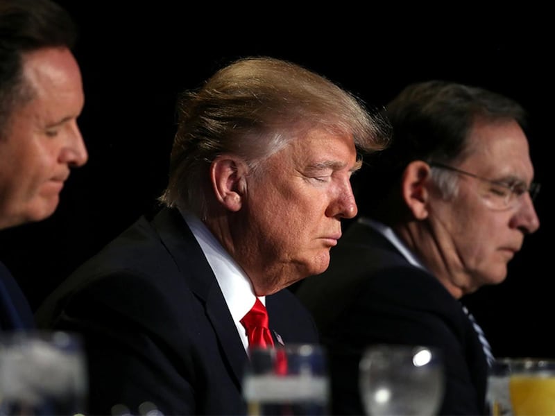 President Trump prays during the National Prayer Breakfast event in Washington, D.C., on Feb. 2, 2017.