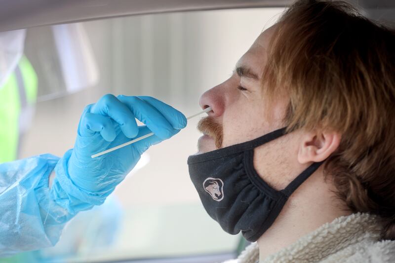Daniel Martin gets tested for COVID-19 at a Nomi Health testing site outside of the Utah Department of Health.